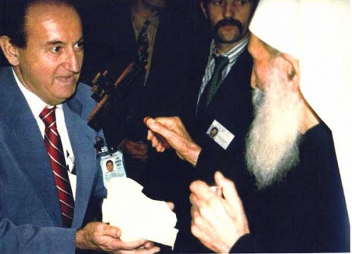 Above: Photo taken of Serbian Patriarch Pavle blessing the native soil of Micheal Pupin's home brought from Yugoslavia. Dr. Ljubo Vujovic is holding the soil. This soil was later dispersed over Pupin's grave.